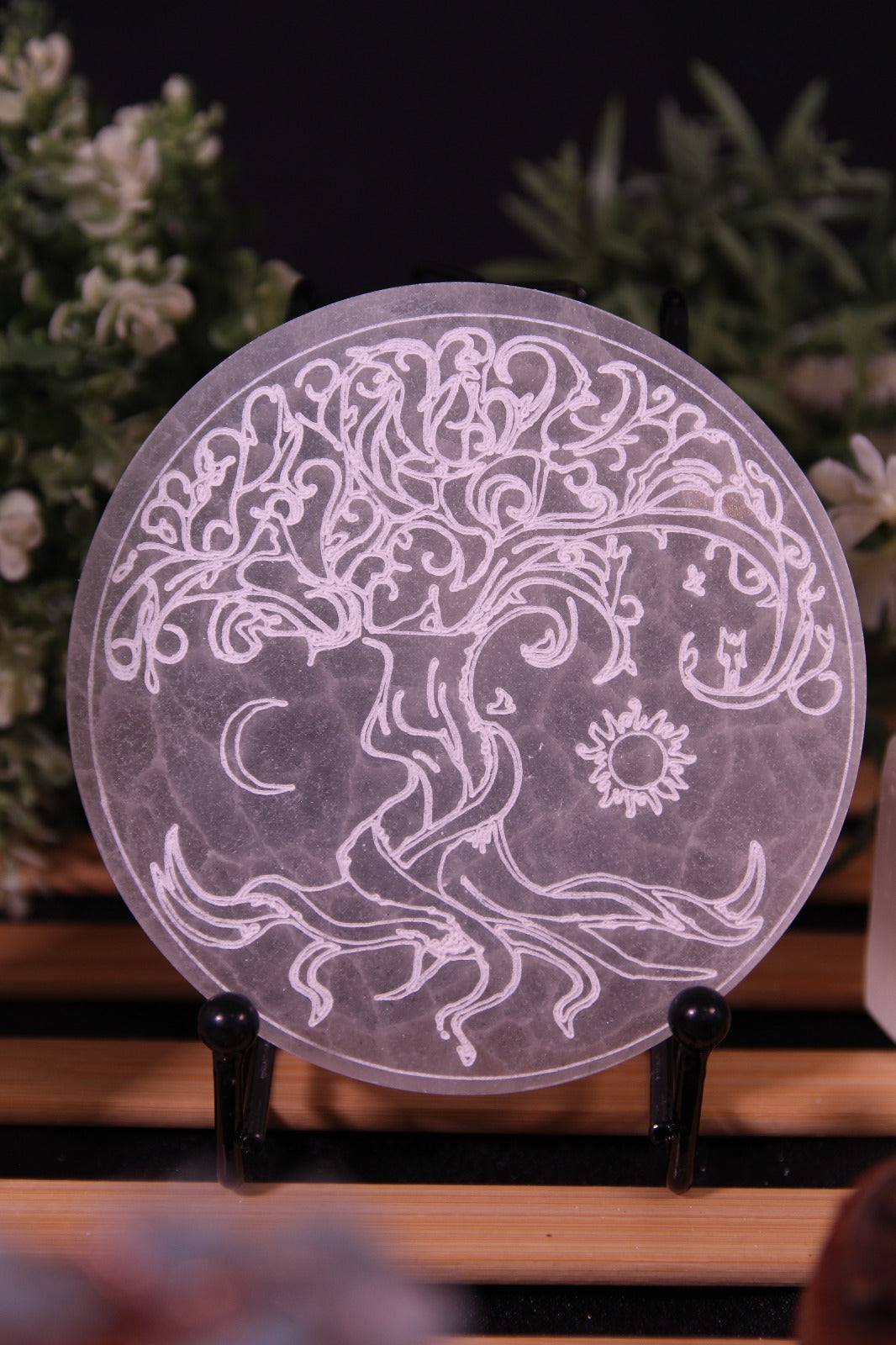 Decorative plate with intricate designs on a stand